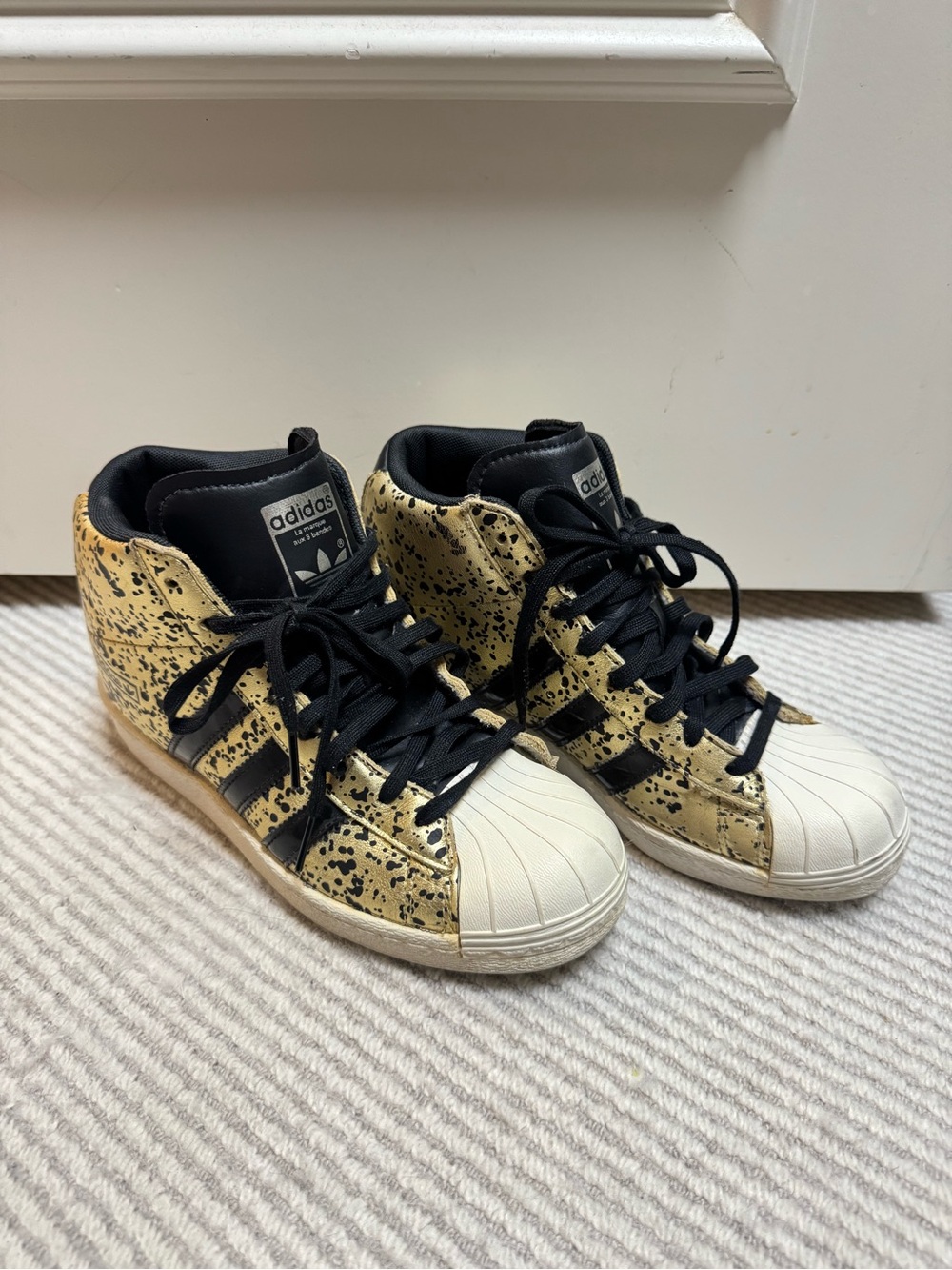 adidas Women’s Black and Gold Speckled High-Top Sneakers